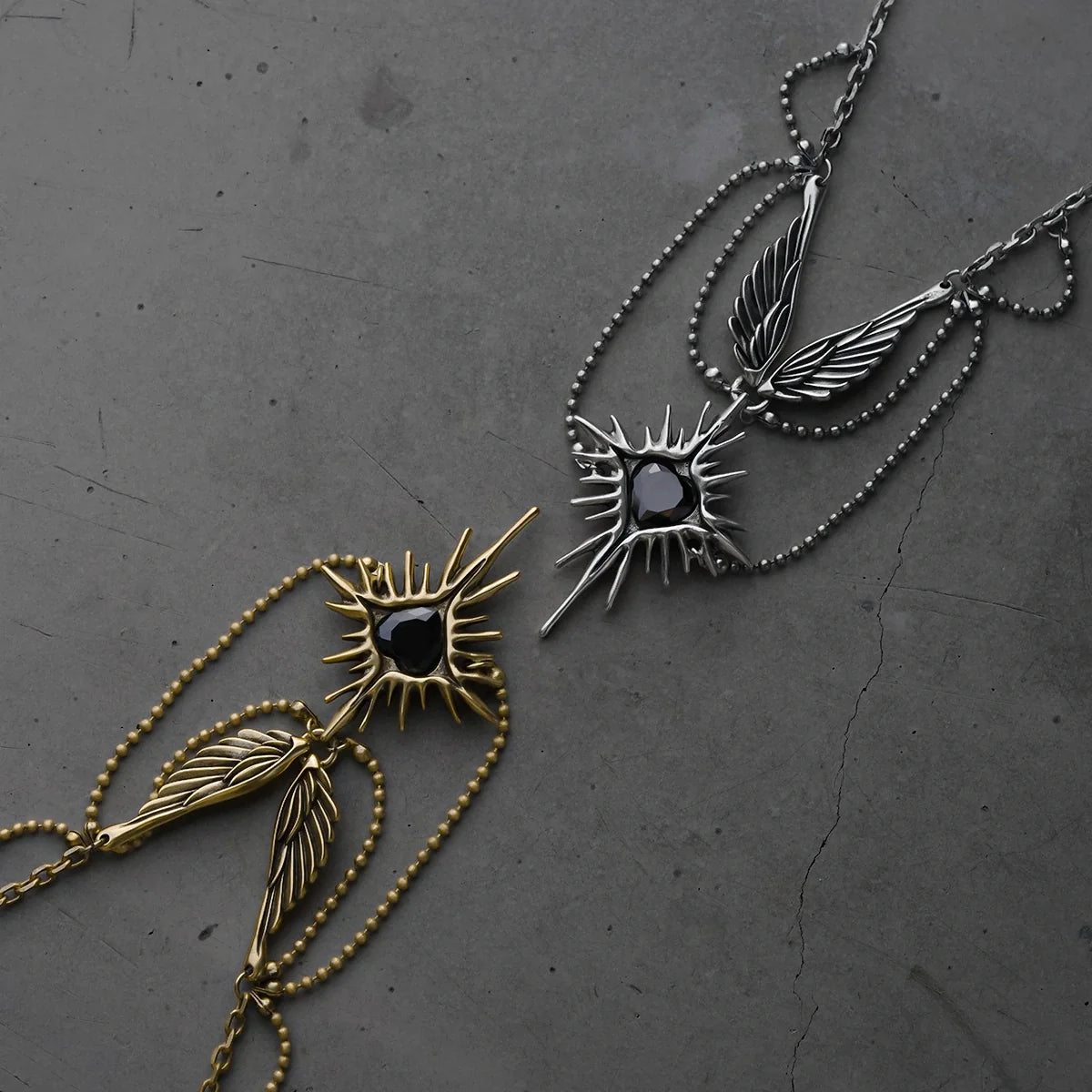 CELESTIAL STARBURST WINGS NECKLACE