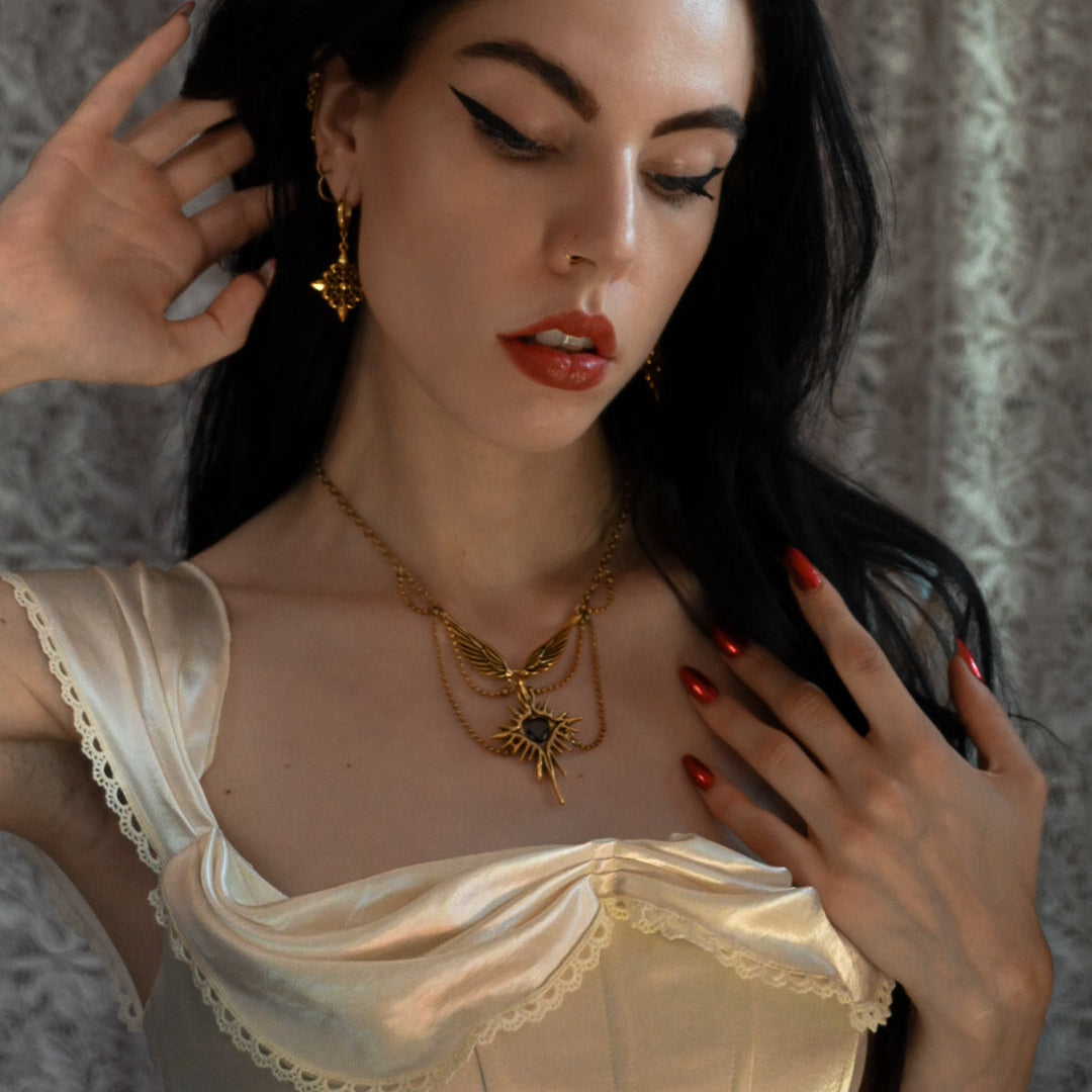 CELESTIAL STARBURST WINGS NECKLACE