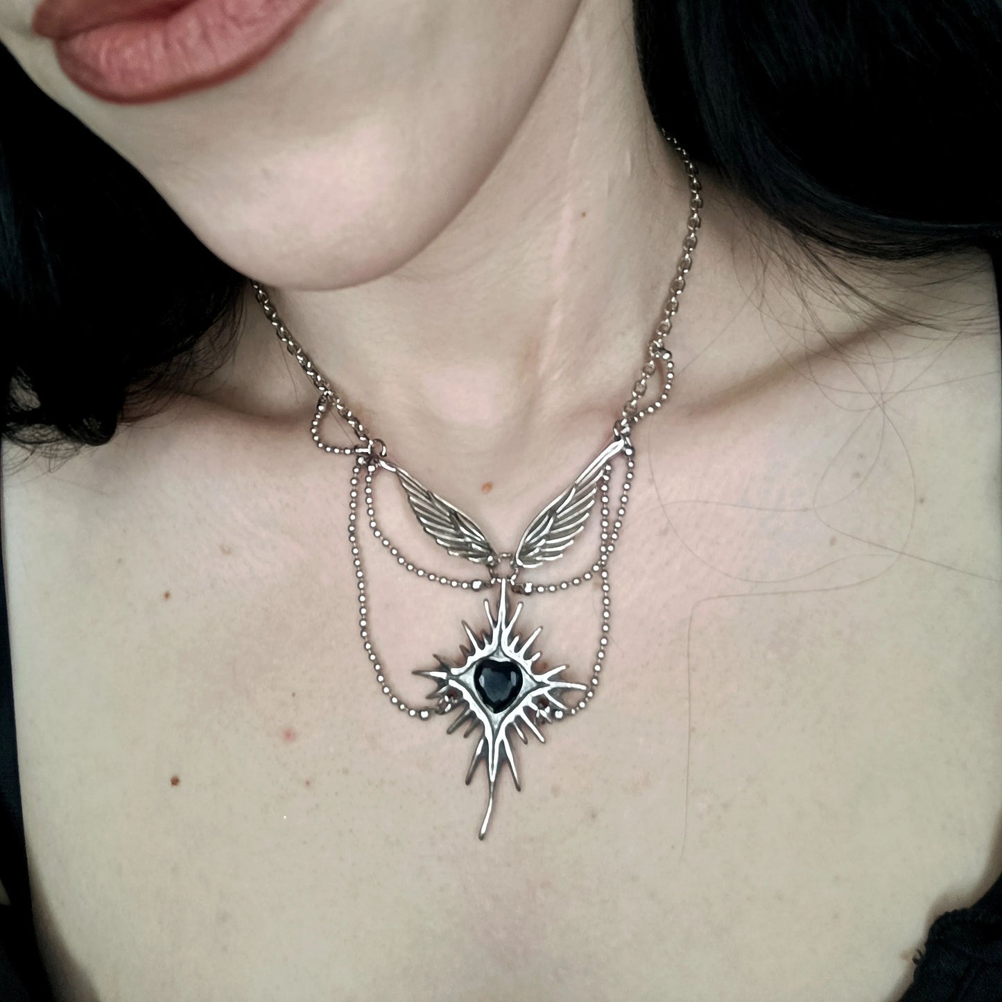 CELESTIAL STARBURST WINGS NECKLACE